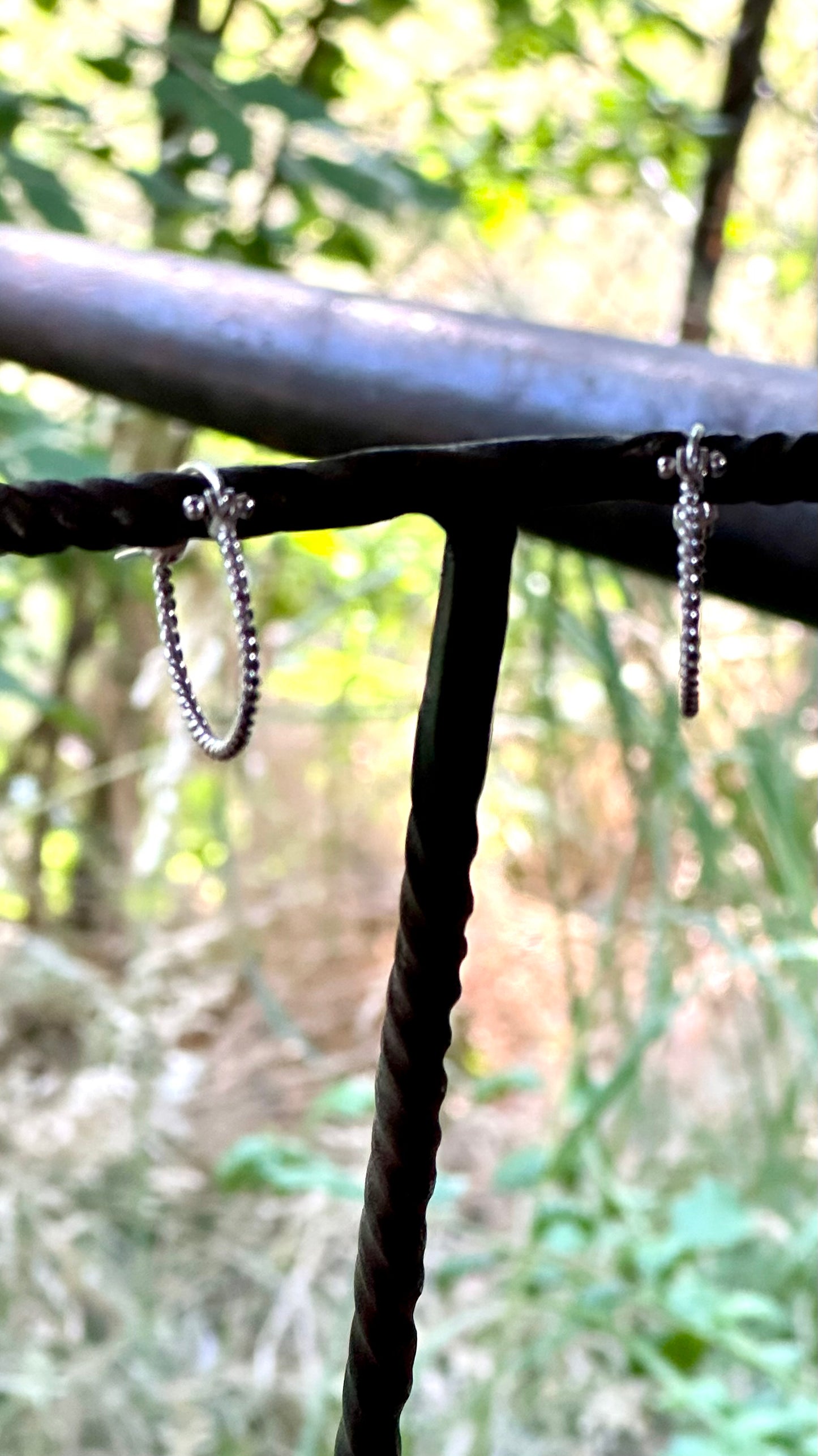 Twisted wire huggie earrings