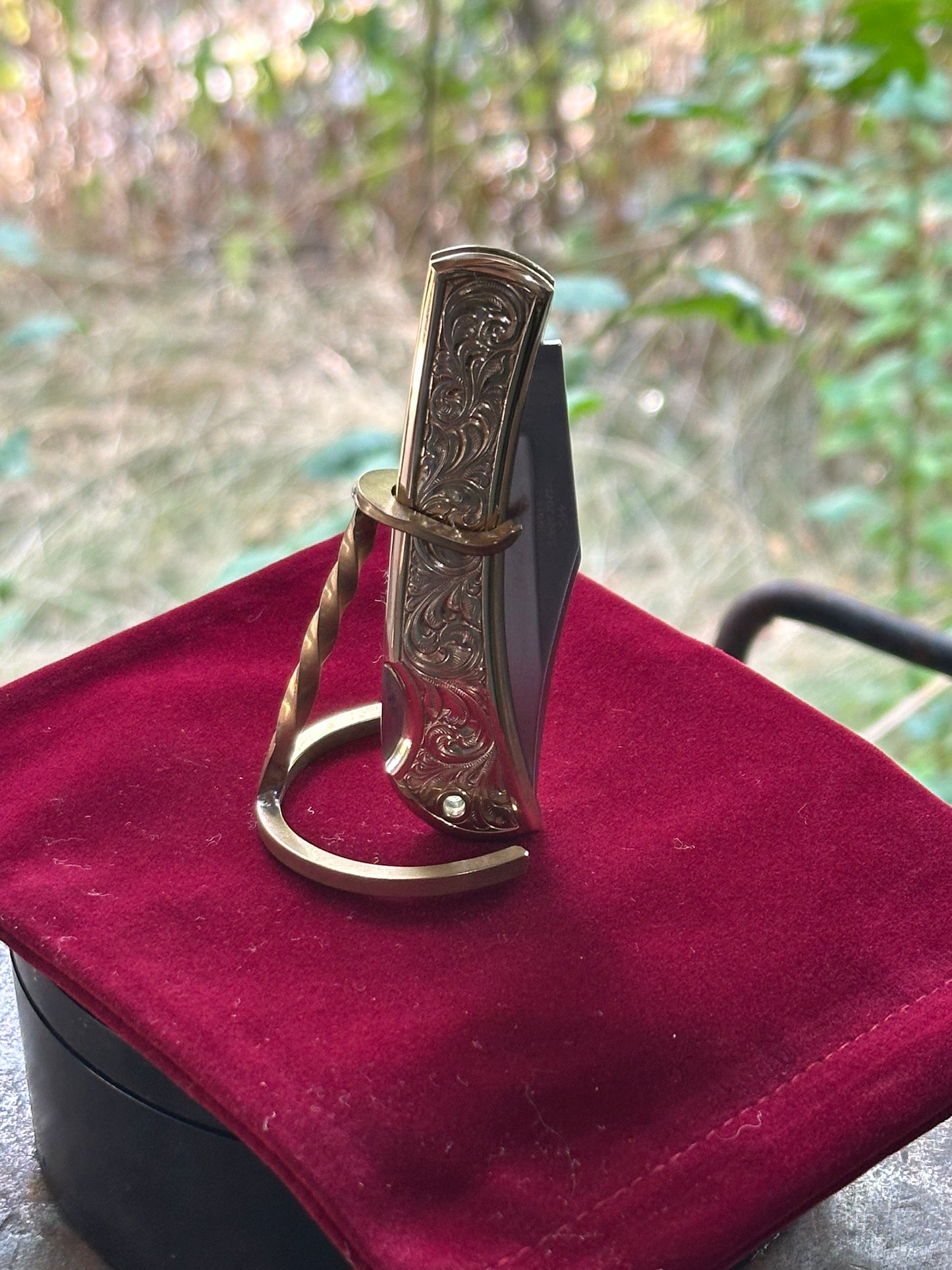 Engraved brass handle knife