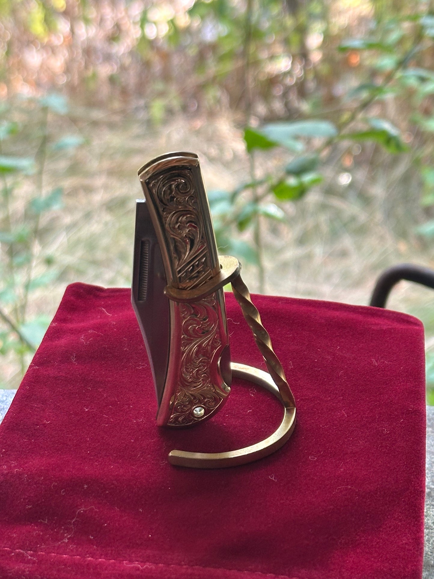 Engraved brass handle knife